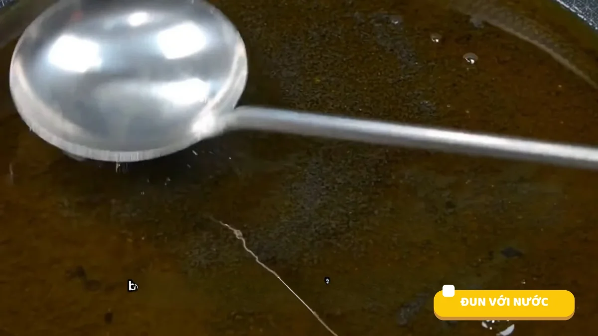 Đun hỗn hợp mè với nước